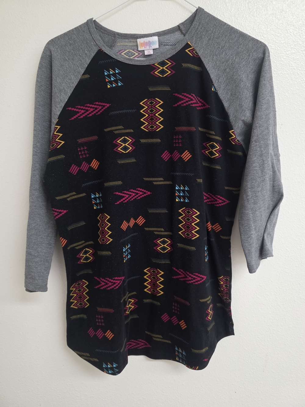 LuLaRoe Black Raglan Sweater with Gray Sleeves and Multicolor Print (0685)